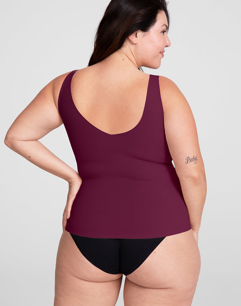 Model Natalie wearing LiftWear Tank in size Plus size one and color Fig, seen from the Back