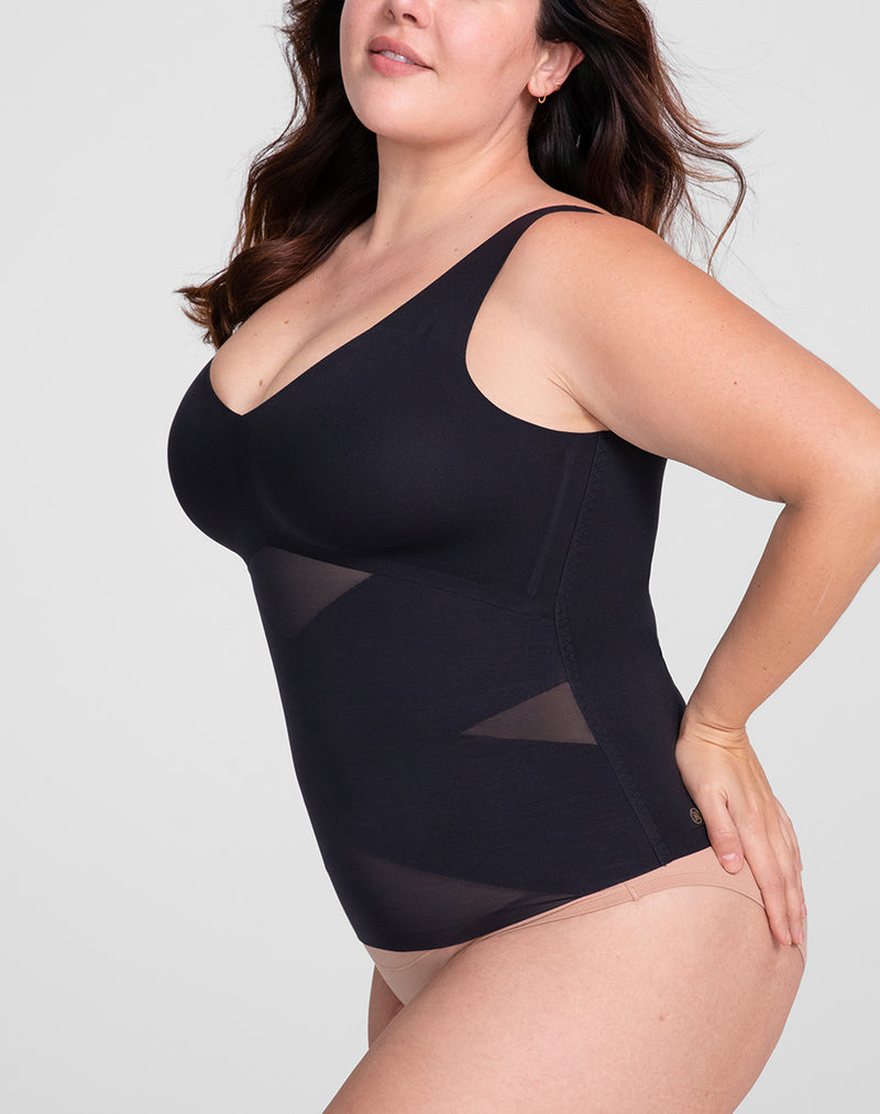 Model Natalie wearing LiftWear Tank in size Plus size one and color Runway, seen from the Side
