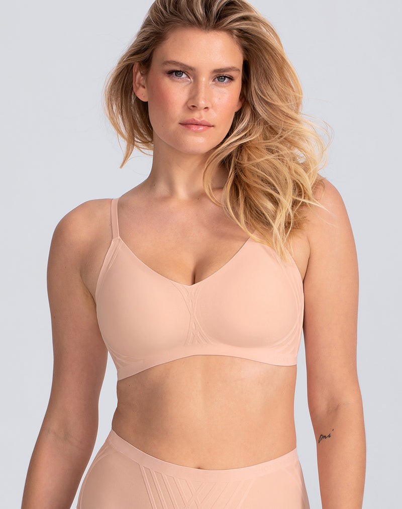 Model Elle wearing Silhouette Bra in size Medium and color Rose Tan, seen from the Front