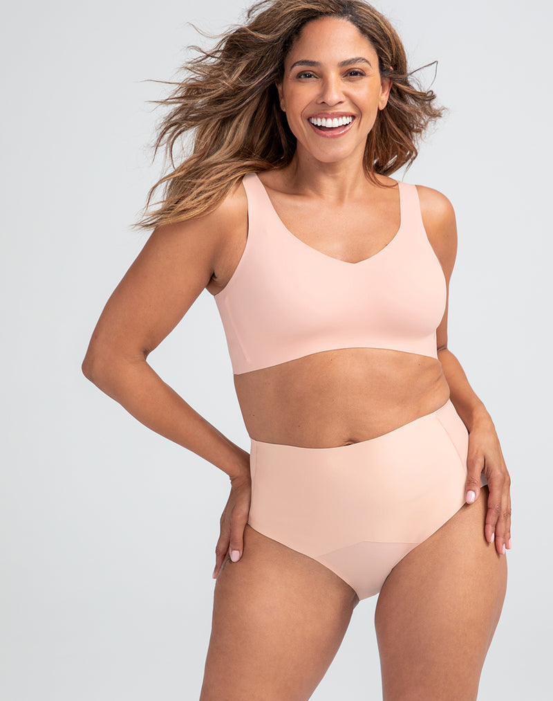 Model Tonya wearing ShineTech Brief in size Medium and color Rose Tan, seen from the Front