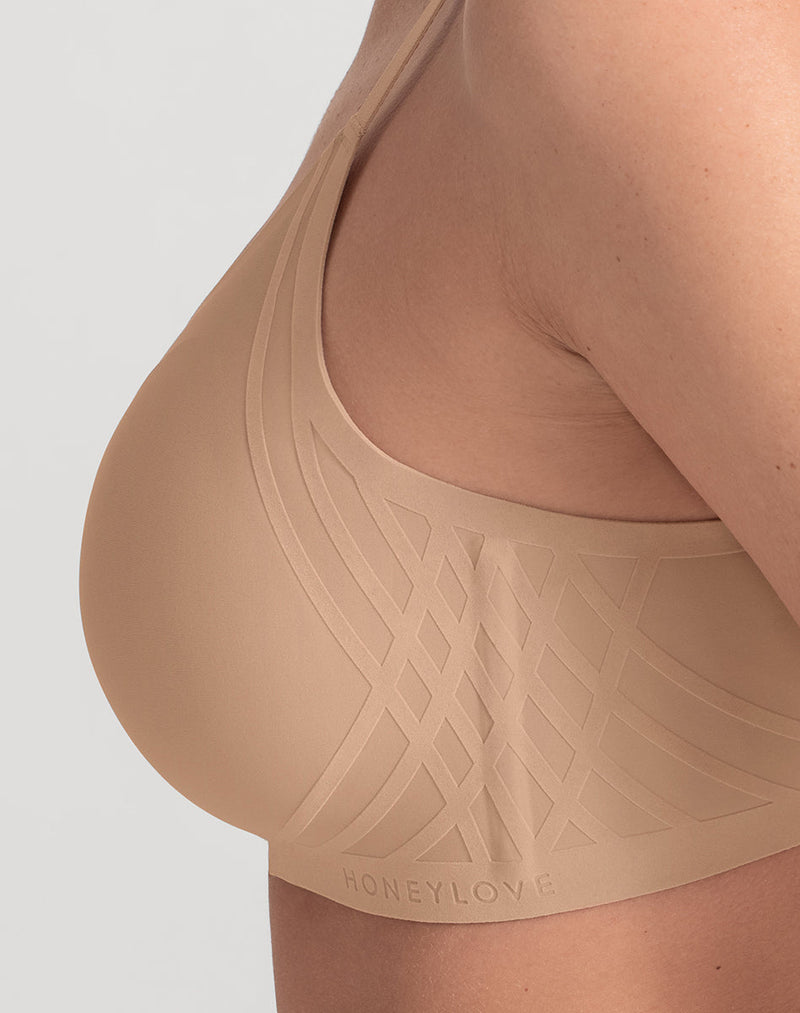 Detail of model wearing Silhouette Bra in color Sand