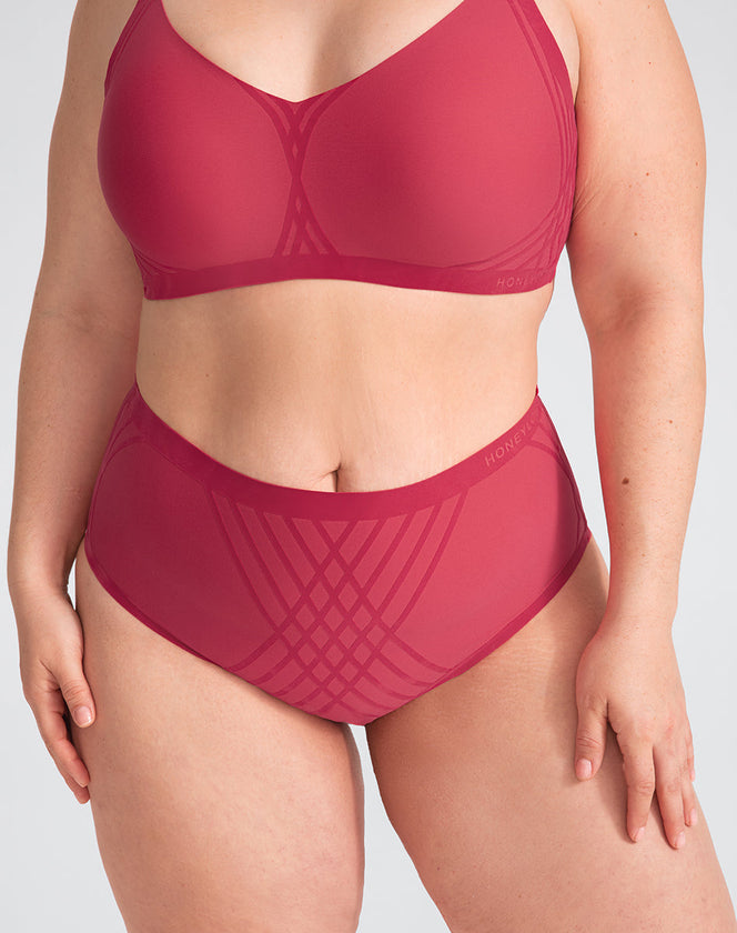 Model Brianna wearing silhouette-brief in size Plus size one and color Peony, seen from the Front