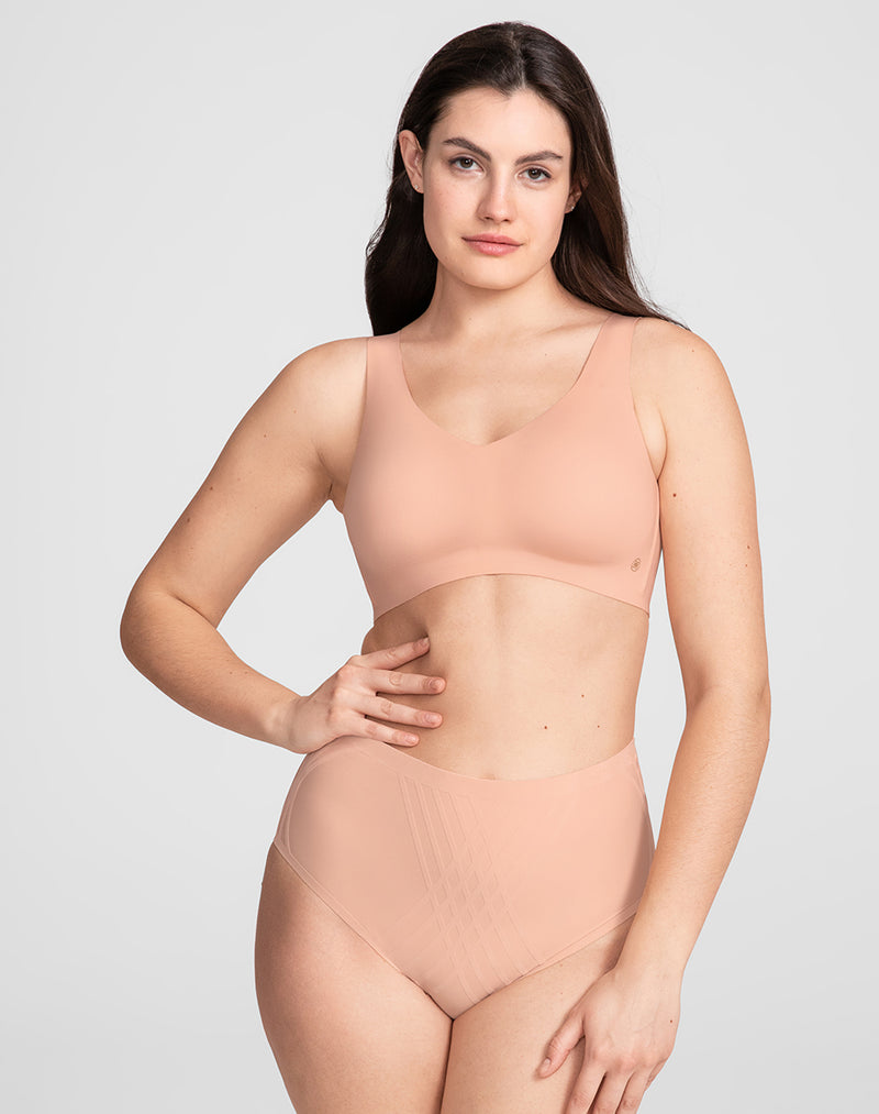 Model Hannah wearing V-Neck Bra in size Medium and color Rose Tan, seen from the Front