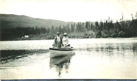 historic family boating on swan lake, mark and debi rolfing, kootenai lodge montana, montana living