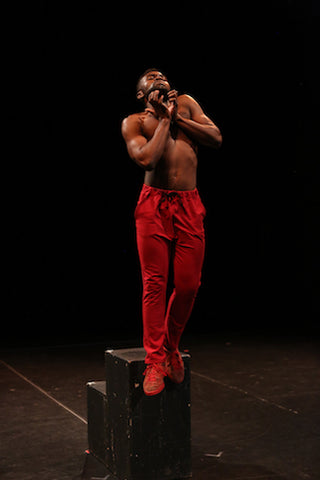 Photo: UM student Tsiambwom Akuchu performs his solo “Every^Man (Alright).” (Photo by Terry Cyr)