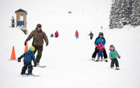 children skiing in montana living