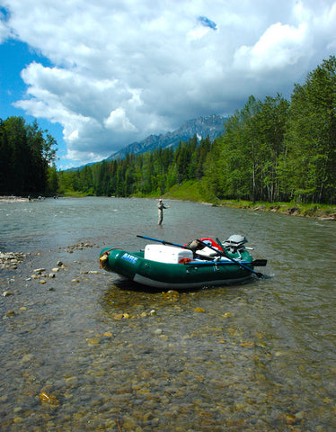 rafting, floating, john hollensteiner holds a cutthroat trout on the elk river in Fernie, British Columbia. David Reese photo, Montana Living