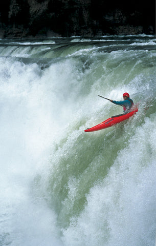 Brennan Guth runs Kootenai Falls near Libby Montana, in this photo from 1998, David Reese photo/Montana Living