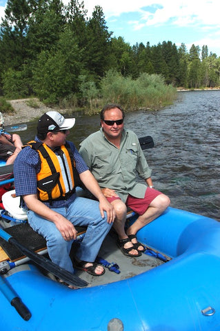 governor brian schweitzer on raft on clark fork river near milltown dam, photo by david reese, montana living