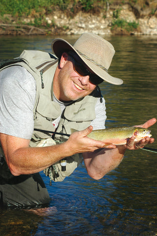 angler  with trout west fork bitterroot