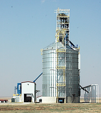 wheat silo in chester, montana, montana agriculture statistics for april 2023, wheat, hay cattle farming and ranching in montana, montana living magazine