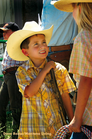 cowboy, bucking horse with cowboy, custer montana ranch rodeo, montana living magazine