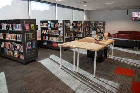 Library furniture, desk, books, school learning space, collaborative space