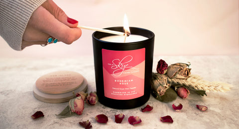 Ciora Isle of Skye Candle Bohemian Rose Woman lighting candle with match