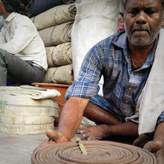 Jaggery Bags - Man Cleaning Fire Hose