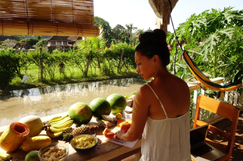 Axiology founder, Ericka Rodriguez, cutting fruit while living in Bali