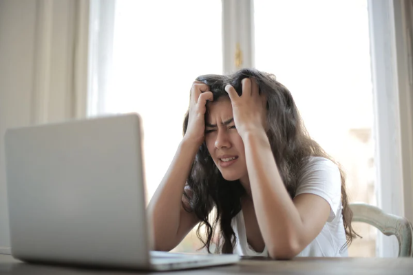 woman pulling out hair