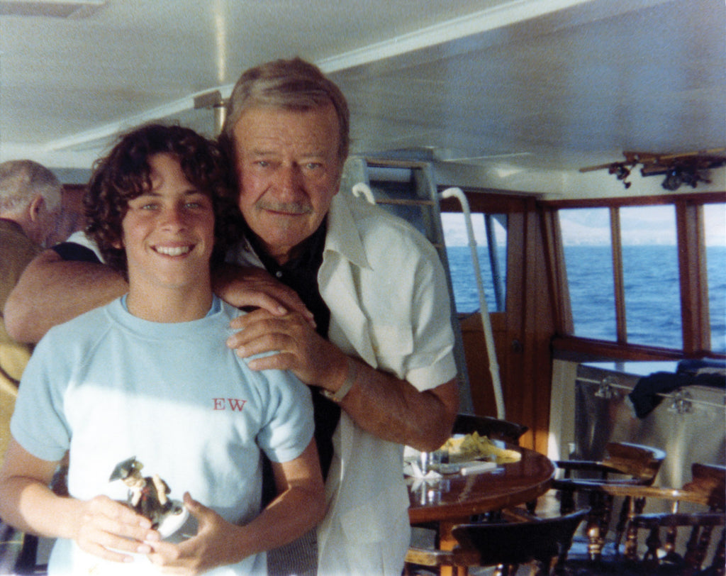 John Wayne with son Ethan Wayne aboard the Wild Goose