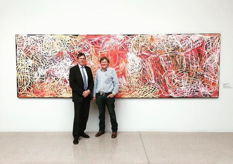 Don Holt with Kelvin Templeton in front of Emily Kngwarreye's "Yam Awelye", donated to the National Gallery of Victoria by the Holt Family. 