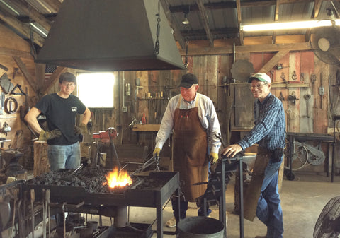 Three friends share knowledge and good times in celebration of a birthday by doing something they love.