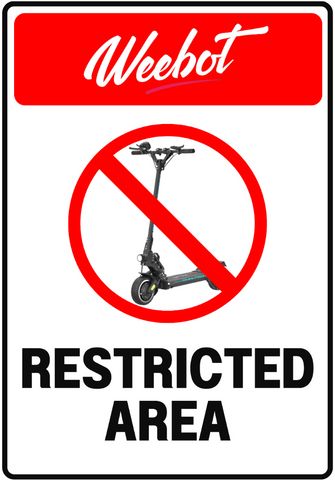 panneau de signalisation indiquant l'interdiction des trottinettes