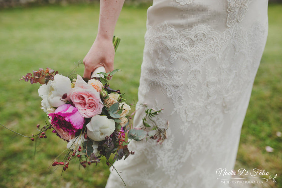 bridal bouquet and wedding dress details