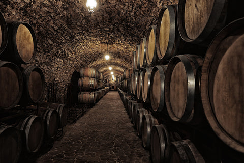 Beer barrels in medieval cellar - The Epicurean