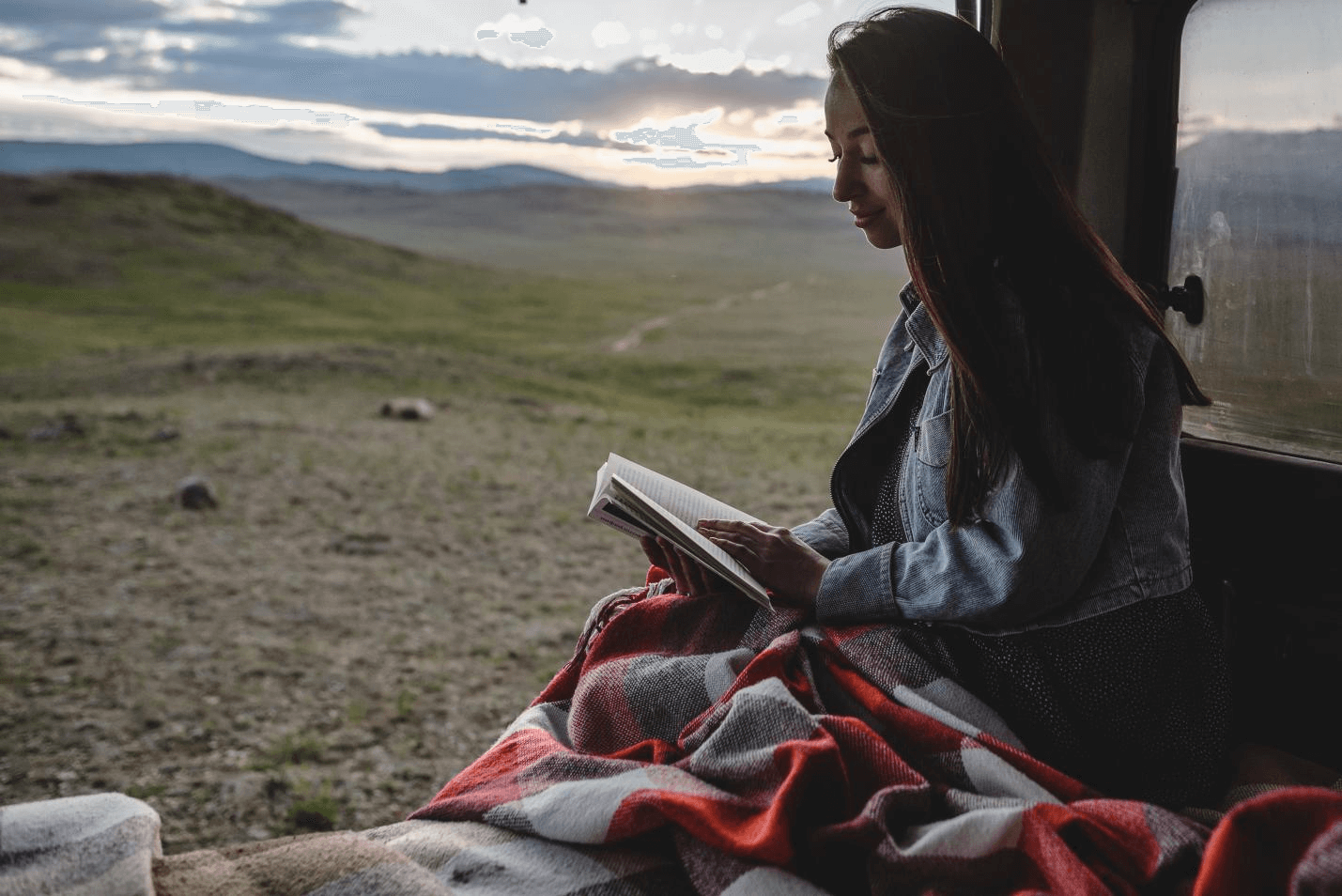 reading a book outdoors