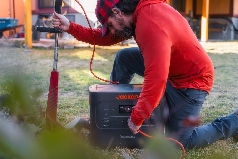 jackery explorer 2000 plus portable power station for charging lawn mower battery