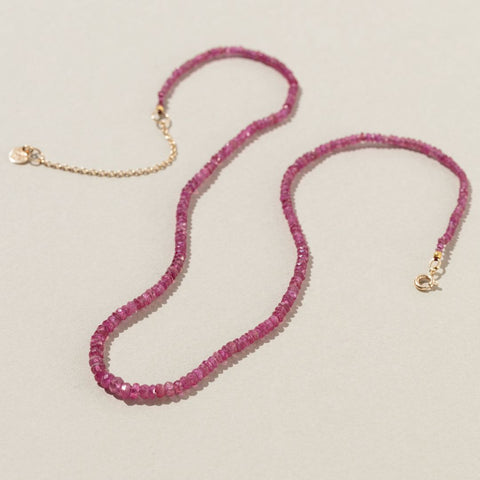 Chronos strand, ruby, 9kt yellow gold