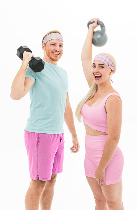 Barbie Inspired photo with a blonde woman and man with fitness equipment making dramatic barbie faces