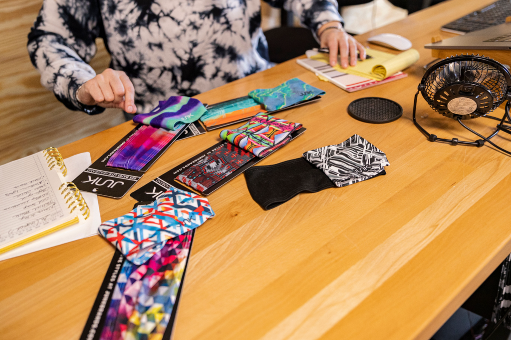 Michelle choosing the final designs and comparing the headband results side by side.