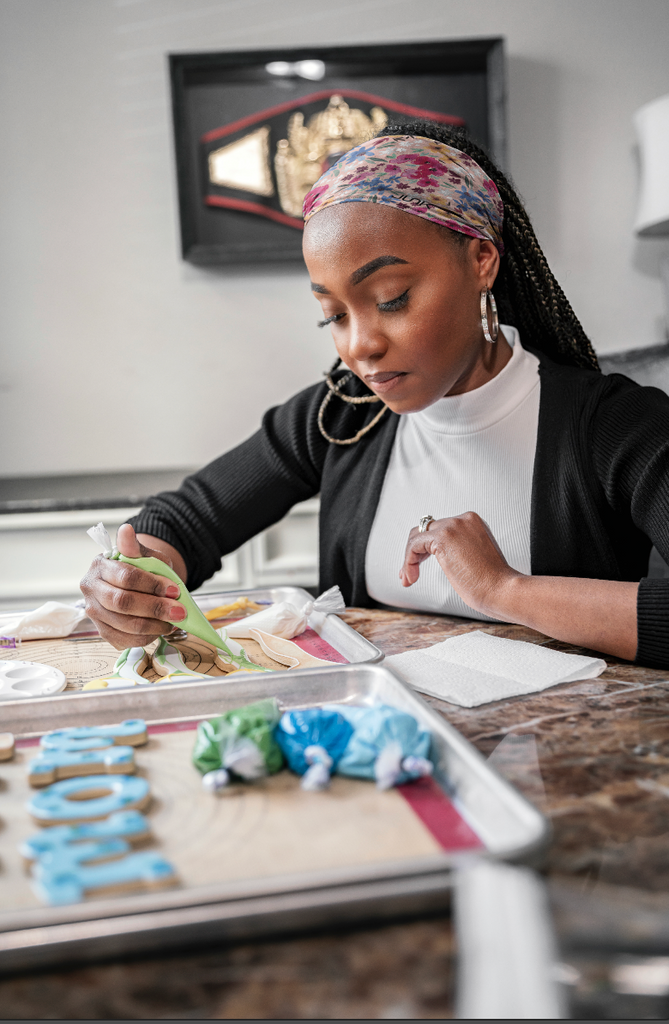 Danielle Decorating Cookies for her business