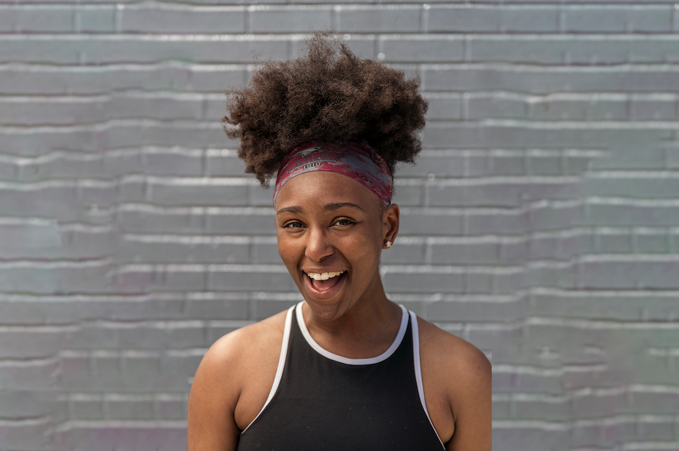 Woman smiling in JUNK's Headband