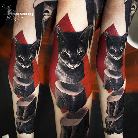 Combination of photorealistic surrealistic motifs with abstract elements in black and red tattoo by Denis Moskalev