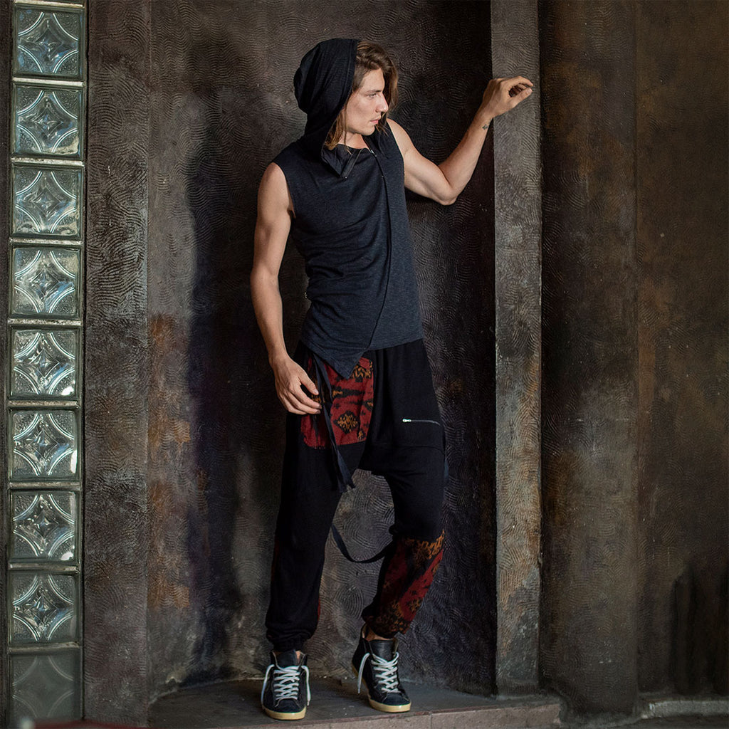 Nariman wearing Psylo Fashion Shemesh Sleeveless Hoodie Tee and Deck Tracksuit Pants 