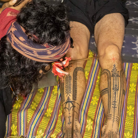 traditional Mantawai tribal tattooing of our creative director and designer, Ami Ganiel during the opening part of our Canggu shop, Bali