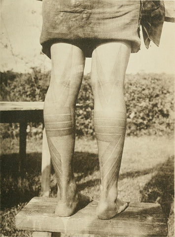 KALABIT TATU (WOMAN) - leg tribal tattoo photo from the 1912 book: "The pagan tribes of Borneo"