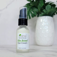 Perfectly Natural Skin's Eye Cream on counter with vase in background