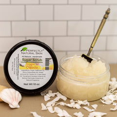 Image of Tropical Colada Sugar Scrub opened with flakes of coconut