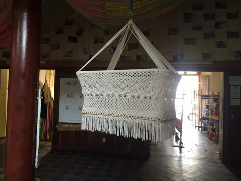 macrame hanging baby crib