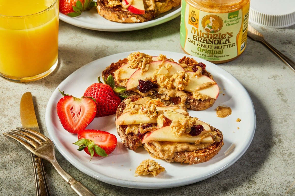 Plate of toast with oat nut butter spread and sliced apples