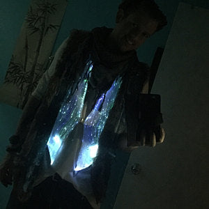 Patrick in his Playa outfit, our Fiber Optic Waistcoat lit up white and glowing front and center.