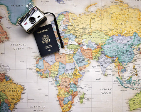 Map with Passport and Camera