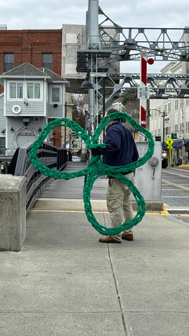 bringing the giant shamrock across the Mystic drawbridge