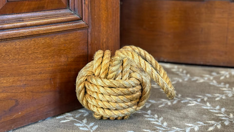 a large manila rope door stop at the Captains Mansion