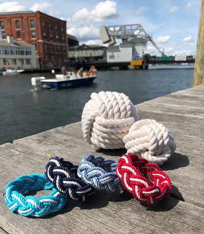 Mystic Knotwork sailor bracelets and monkey fists on dock