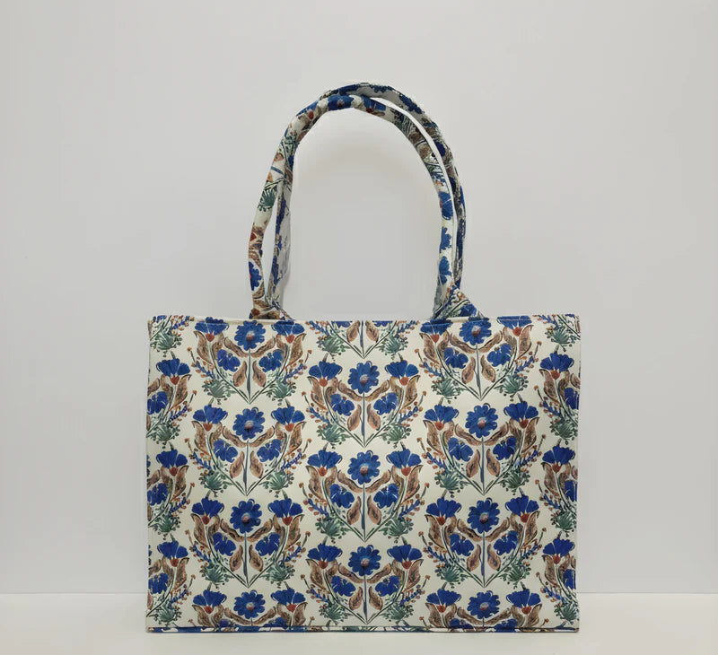 Floral patterned canvas tote bag on a white background