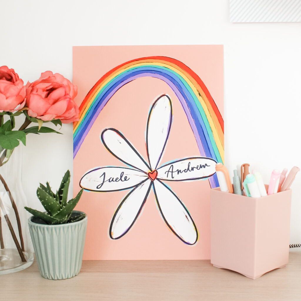 An image of one of Jade's personalised and illustrated prints featuring a flower and a rainbow