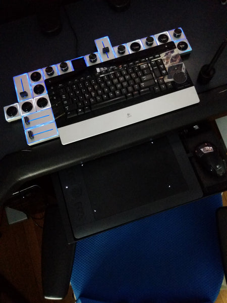 Close up shot of keyboard, Wacom tablet, and Palette Gear's tactile, precision controls, used for photo and video editing in Lightroom, Photoshop, and Premiere Pro